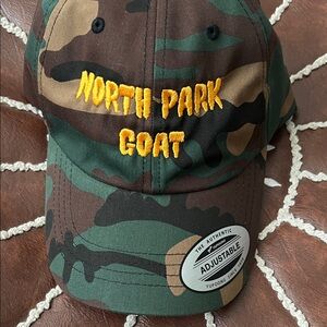 Camouflage 'North Park Goat' Embroidered Dad Hat - Yellow Stitching